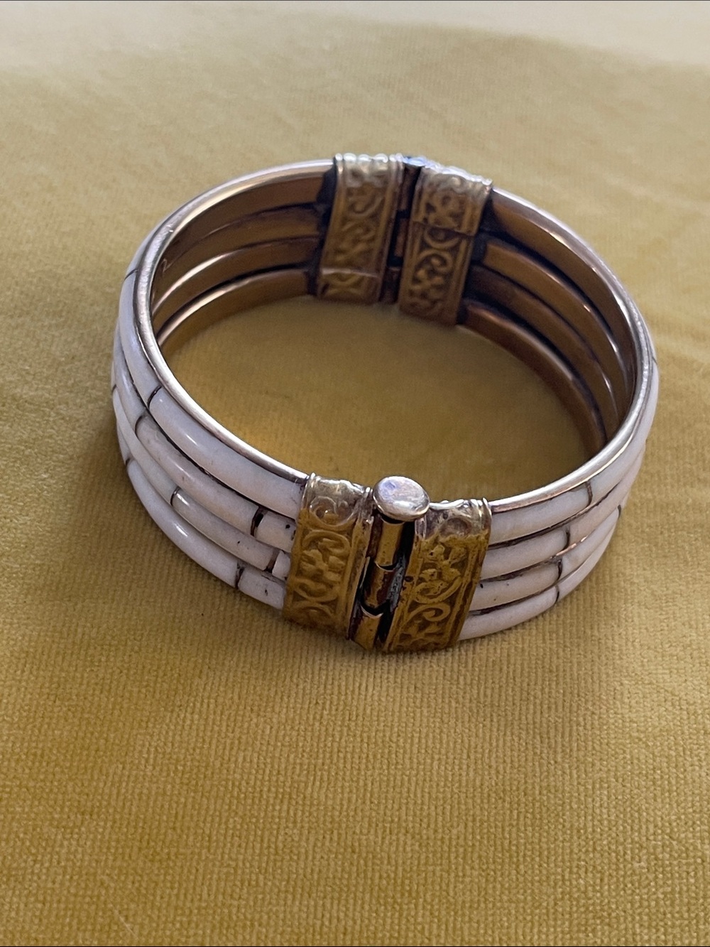 vintage boho-style hinged bone & brass bangle bracelet